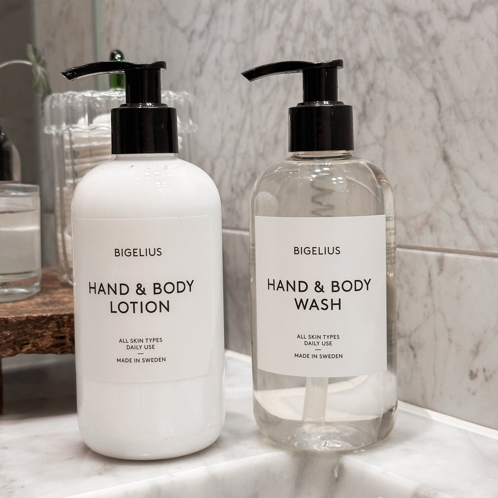 Image showing Bigelius Hand & body lotion and Hand & body wash standing in a bathroom